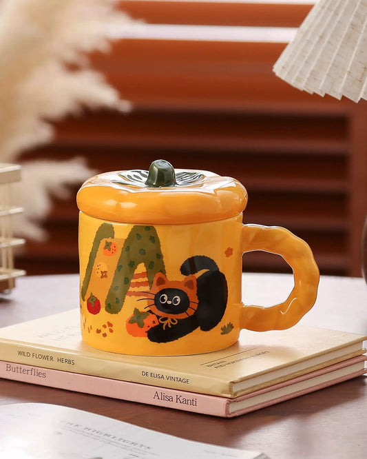 Acogedora taza de cerámica con forma de gato y calabaza