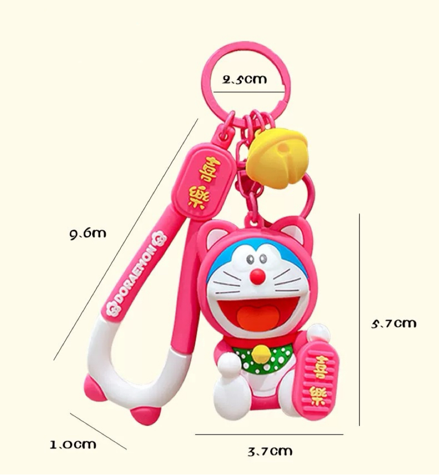 Doraemon Keychains - Cute Pink, Purple & Green Designs with Gold Coins for Bags and Keys