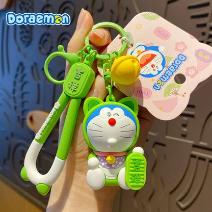 Doraemon Keychains - Cute Pink, Purple & Green Designs with Gold Coins for Bags and Keys