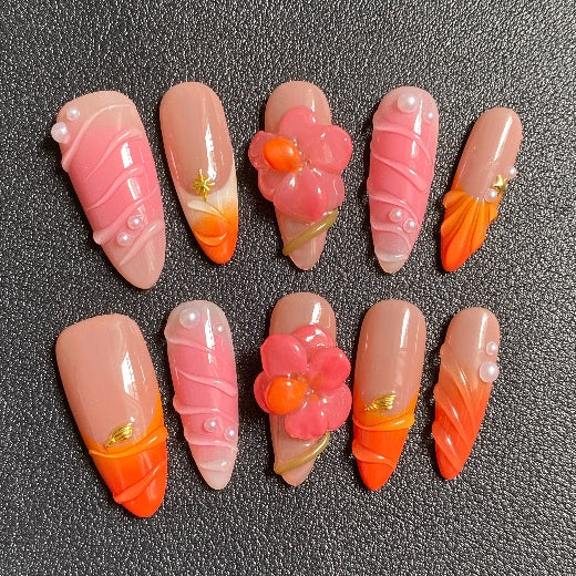 Uñas postizas con diseño floral de coral tropical