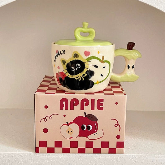 Preciosa taza de cerámica con forma de manzana y gatito