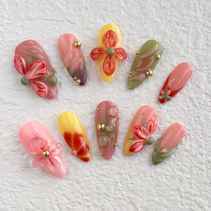 Uñas postizas con diseño de jardín floral vibrante