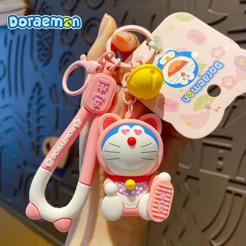 Doraemon Keychains - Cute Pink, Purple & Green Designs with Gold Coins for Bags and Keys