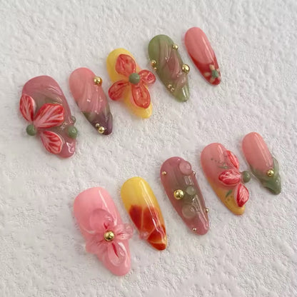 Uñas postizas con diseño de jardín floral vibrante