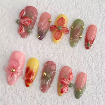 Uñas postizas con diseño de jardín floral vibrante